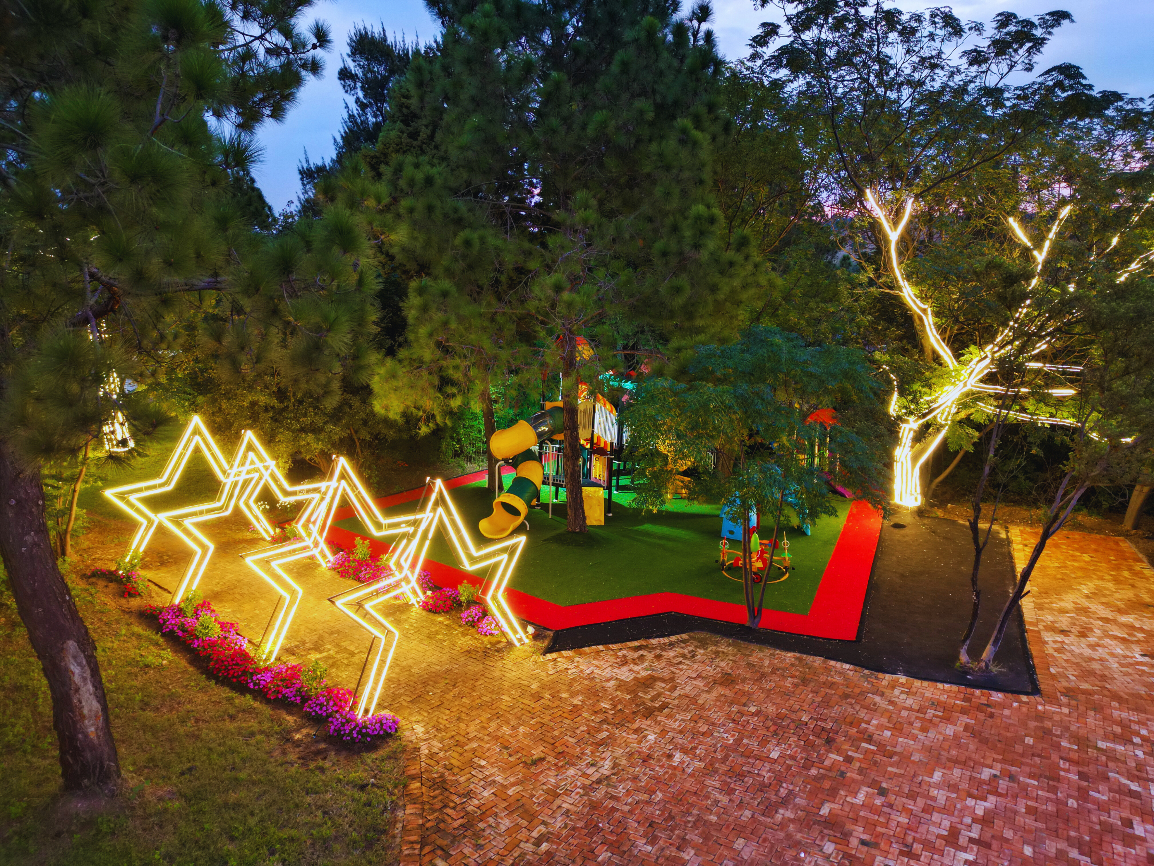 Lora Gardens at night